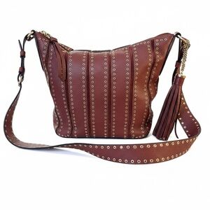 Michael Kors Pebbled Leather Brick Red Grommet Pattern Shoulder Bag with Tassel